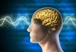 Conceptual drawing of a human head showing the brain, with electric waves going through the head