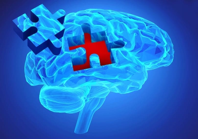 Illustration of human brain with puzzle piece missing, depicting memory loss as a symptom of dementia