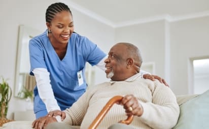 Shot of a nurse speaking to her male patient