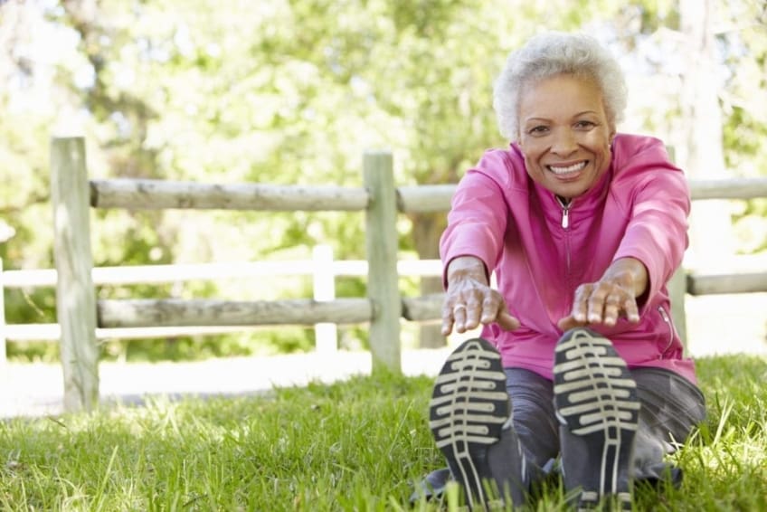 senior african american woman exercising in park